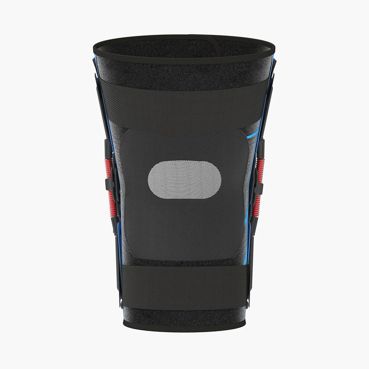 Back view of the Nübrace Active Knee Brace in black, showing the red springs on both side hinges, a breathable mesh panel and adjustable straps, on a white background.
