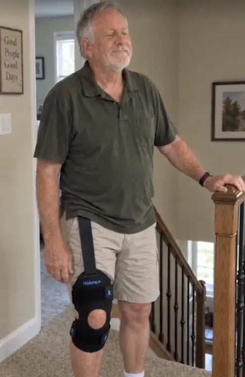 Paul wearing Walk Assist at home