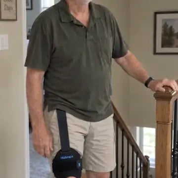 Paul wearing Walk Assist at home
